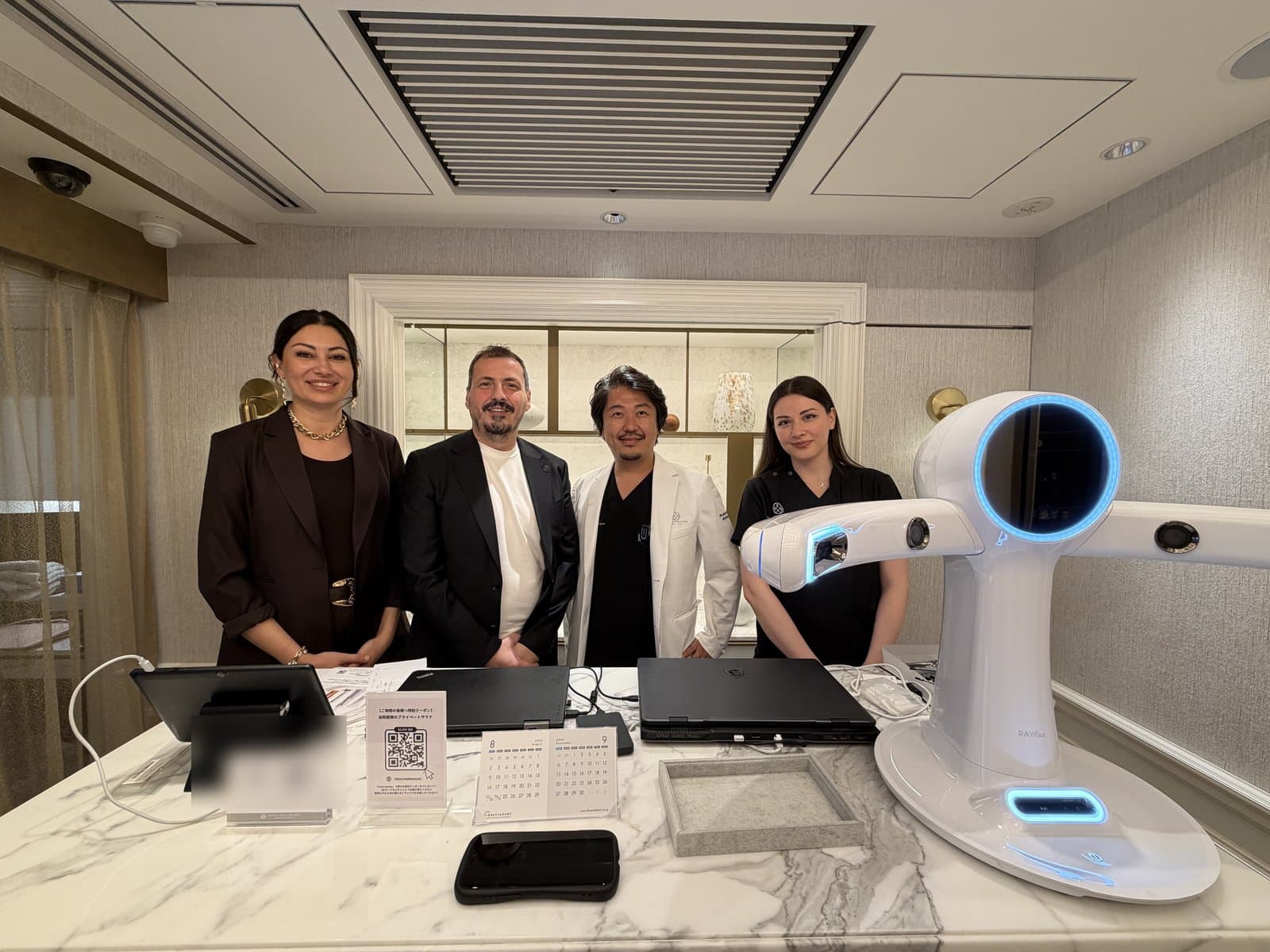 Demonstrating the facial scanner and digital workflow